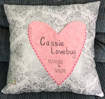 dog memorial pillow back with name of dog on heart