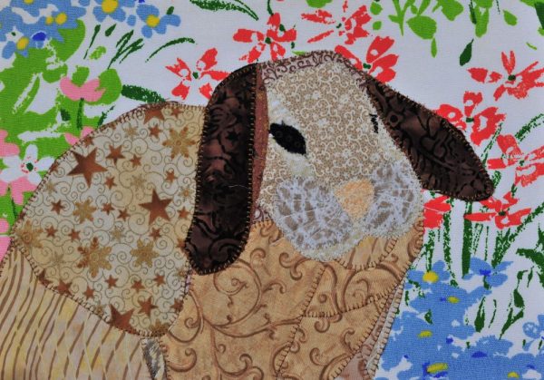 fabric bunny on canvas close up