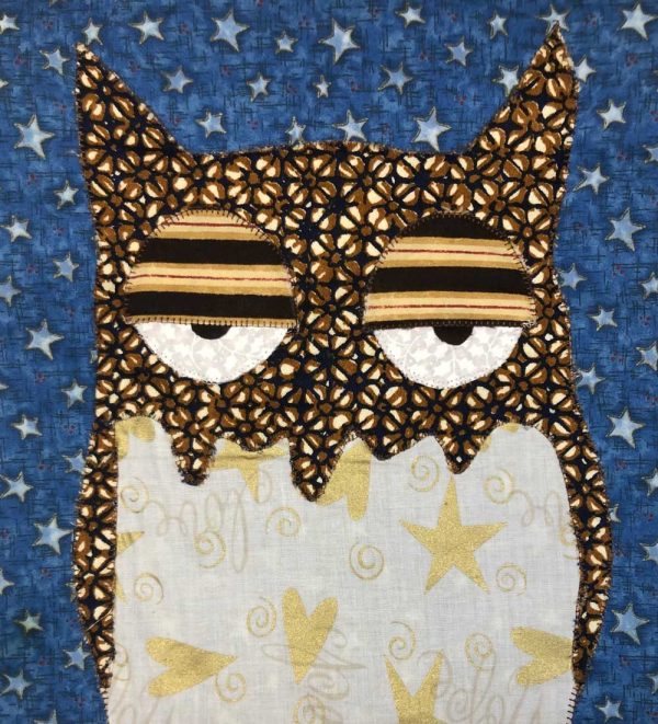 sleepy brown owl wall hanging with stars
