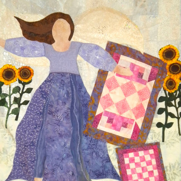 quilted wallhanging representing cancer survivor