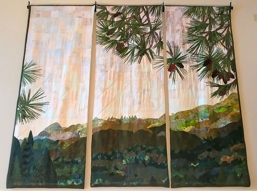 up-close photo of 3-panel large landscape wallhanging