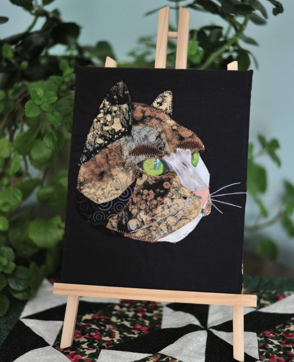 Head portrait of Brown Prowling Cat picture on Easel
