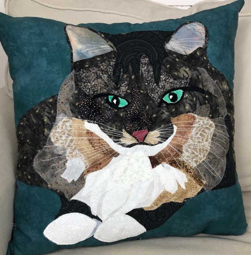 brown and white cat on fabric pet portrait pillow