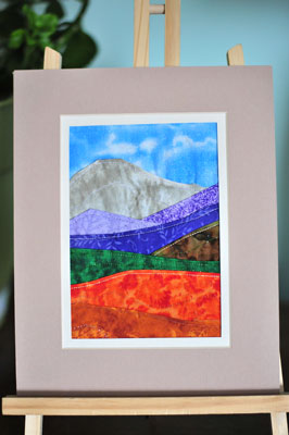 early fabric landscape matted picture with mountain and hills